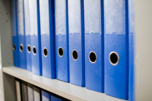 colorful-archive-folders-documents-shelves-office_98958-23